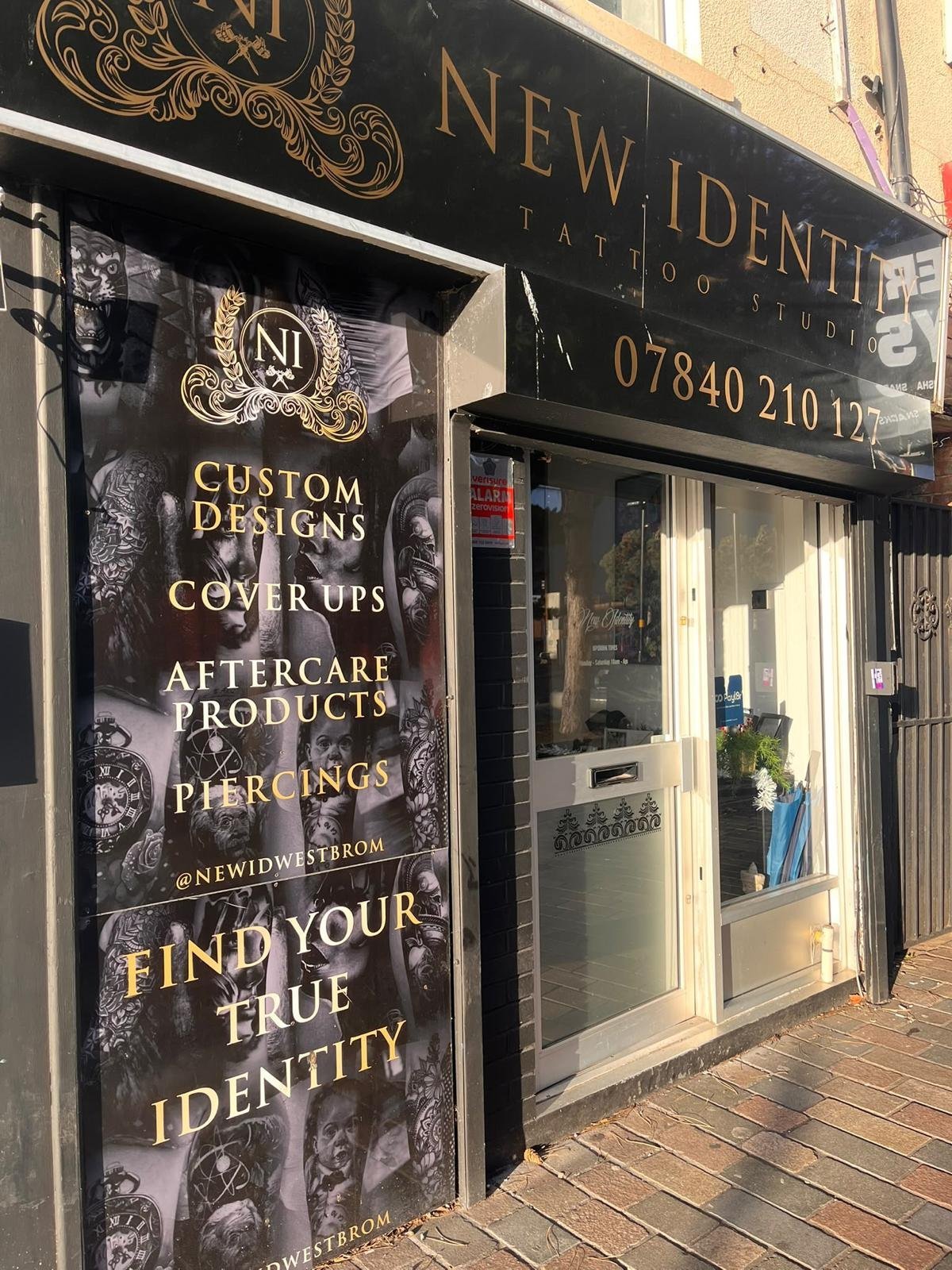 New Identity Tattoos West Bromwich shopfront on New Street